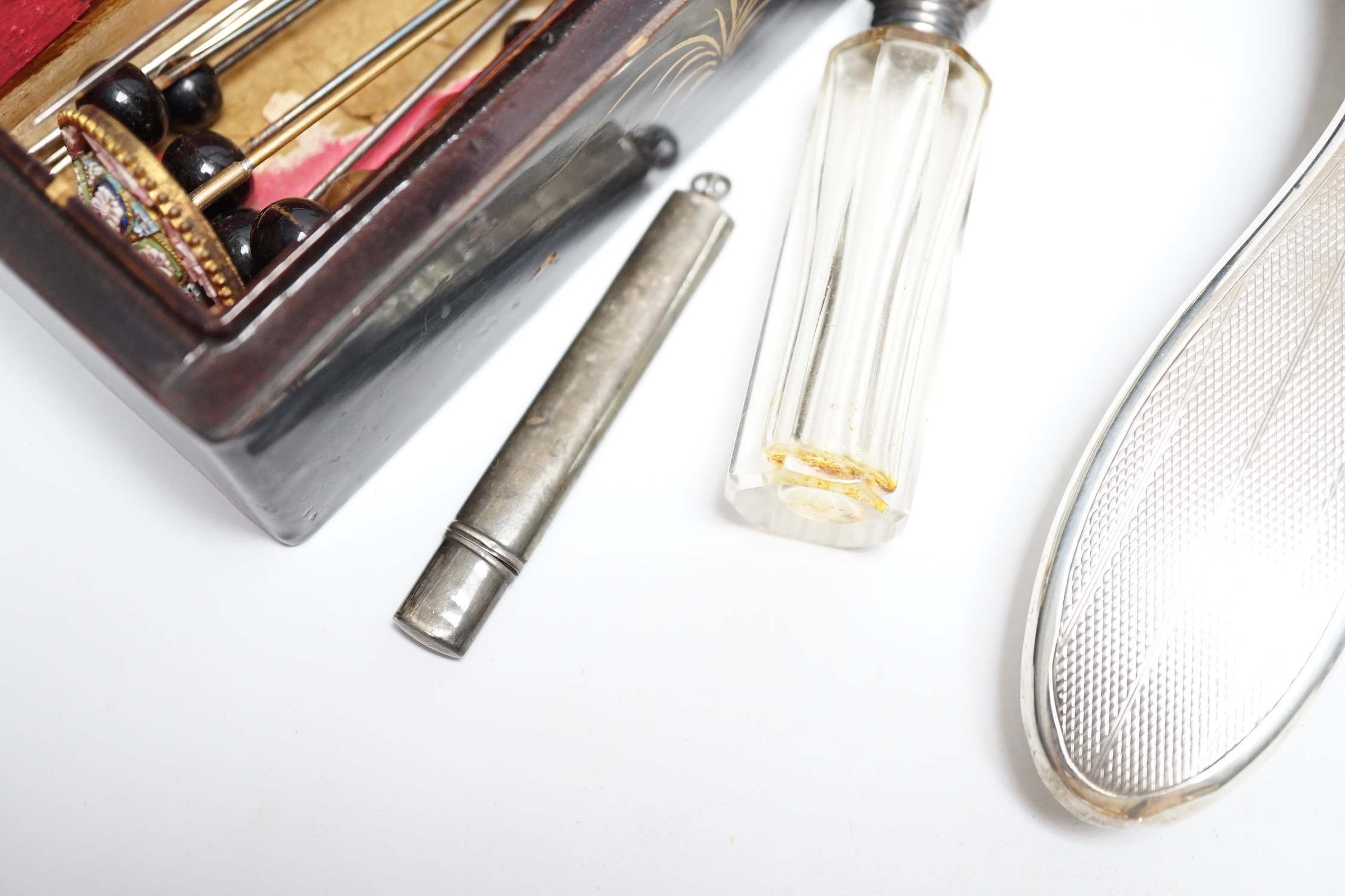 Sundry silver and other items including a four piece mirror and brush set, propelling pencils, silver albert and hatpins including three silver by Charles Horner.